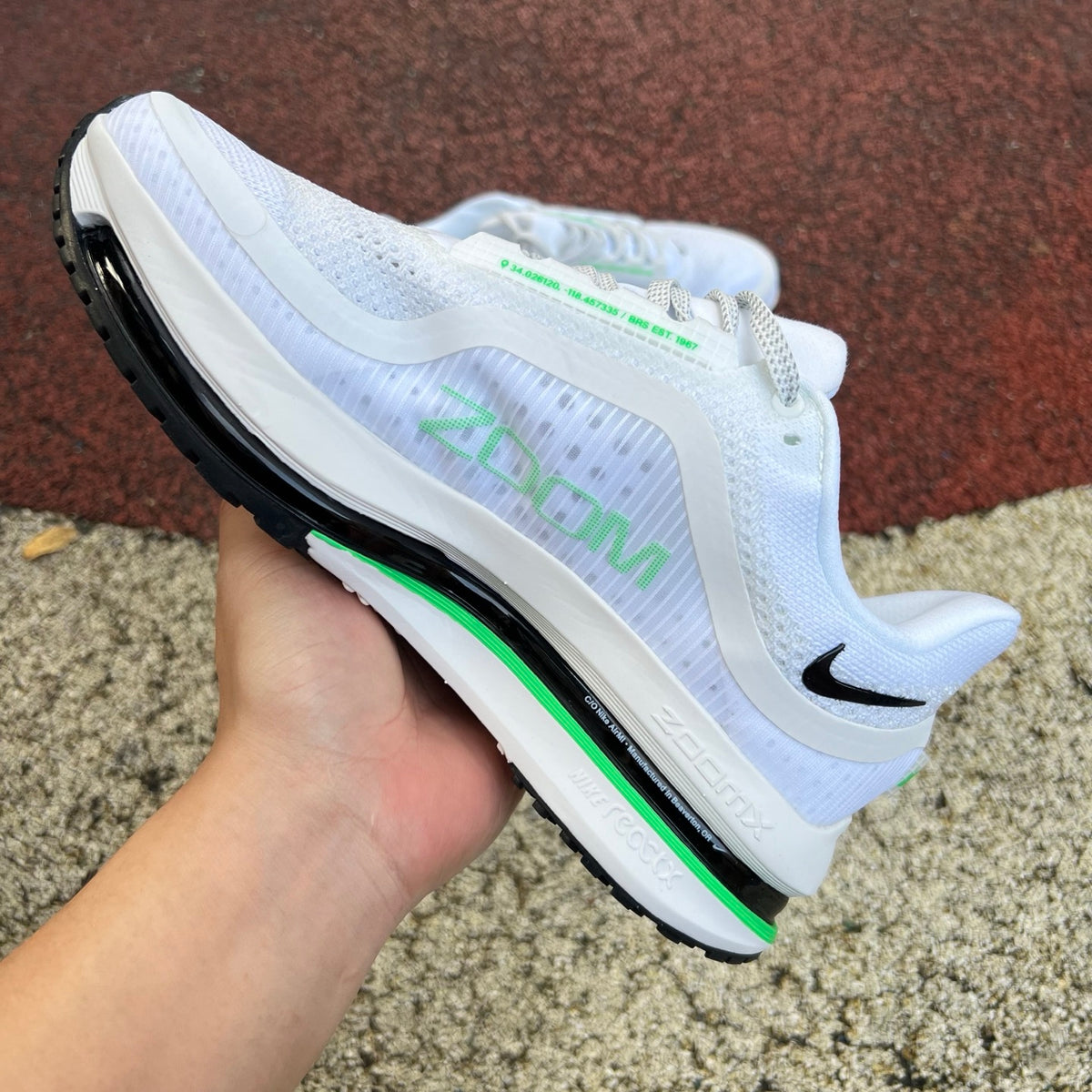Nike Air Zoom Pegasus sneakers in Seahawks colorway, featuring Nike x Jordan branding and sporty design.