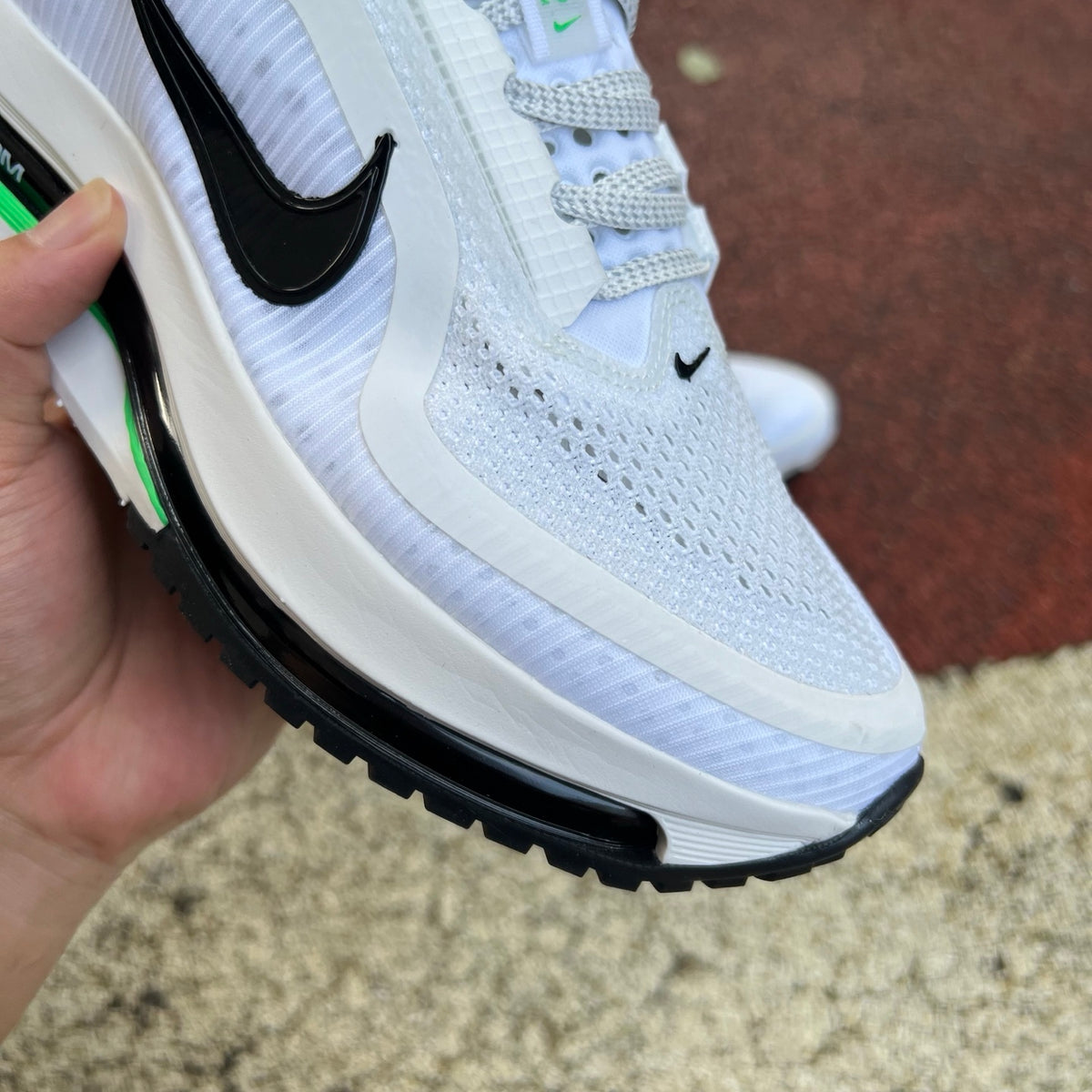 Nike Air Zoom Pegasus Premium running shoes featuring Seahawks team colors and athletic design, with Nike x Jordan branding.