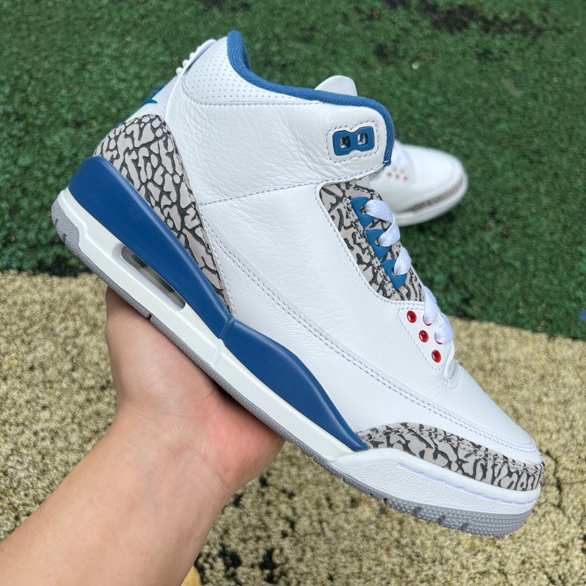 Nike Air Jordan 3 Retro True Blue sneakers from Nike x Jordan, featuring classic blue and white design and iconic styling.