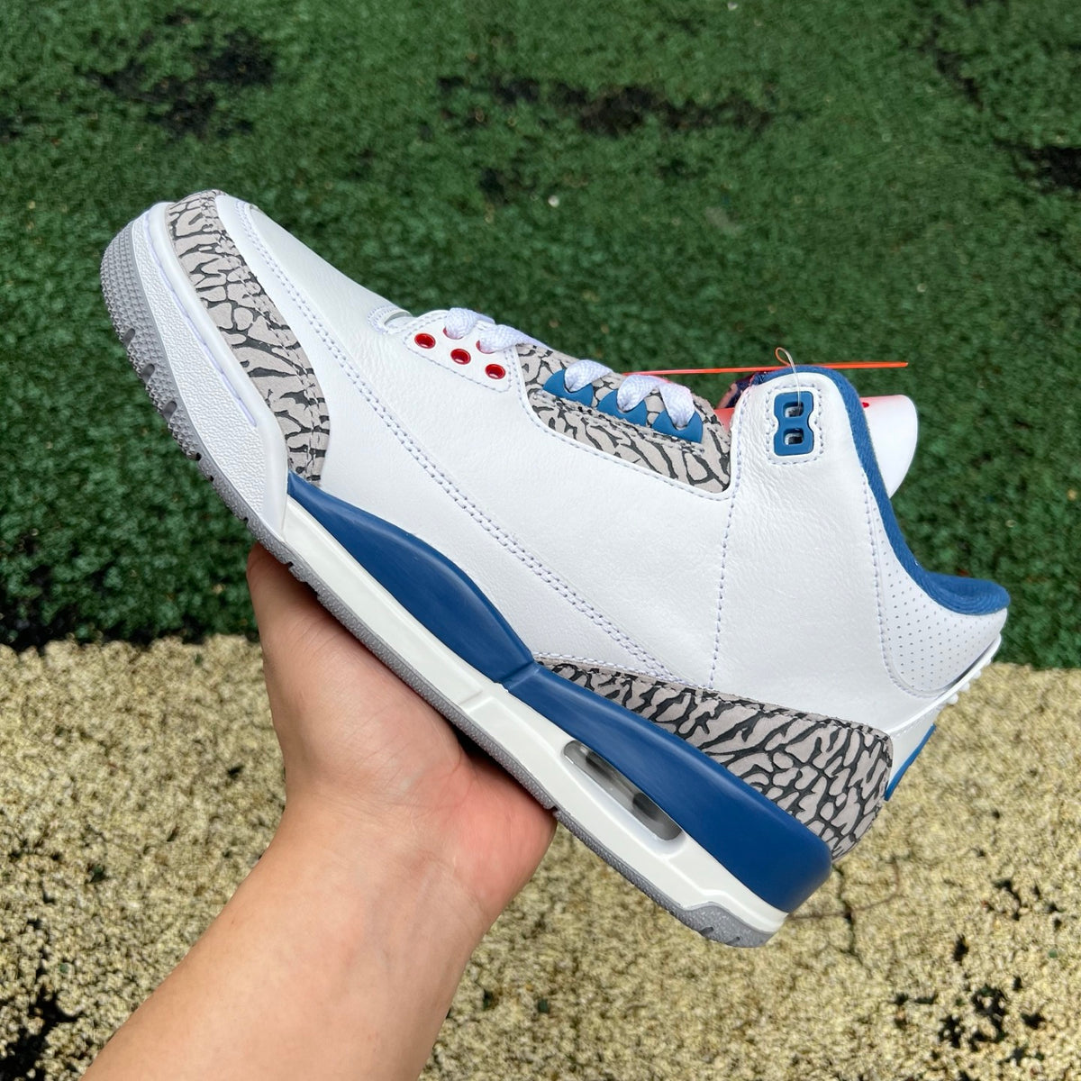 Nike Air Jordan 3 Retro True Blue sneakers in white and blue leather with gray accents, featuring iconic design details.