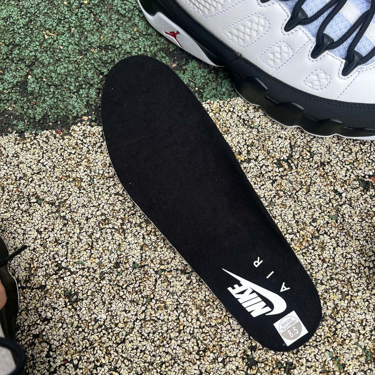 Nike Air Jordan 9 Retro OG Space Jam sneakers in black and blue with Jumpman logo and signature design details.