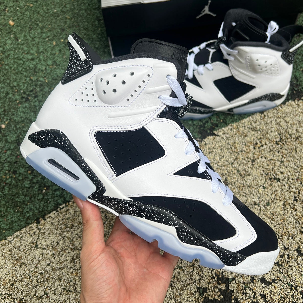 Nike Air Jordan 6 Retro Oreo sneakers in black and white with textured accents, showcasing the classic Jordan design.