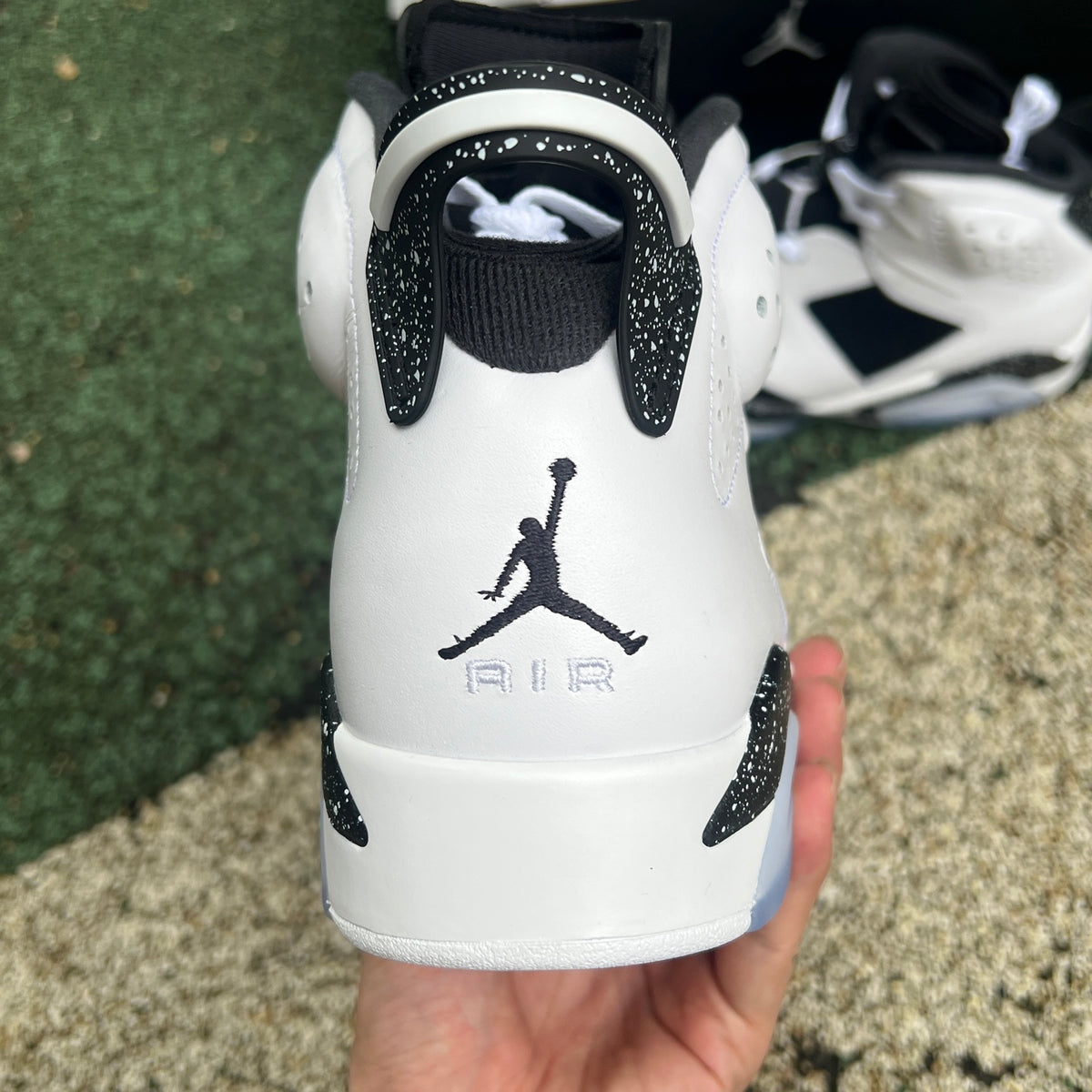 Nike Air Jordan 6 Retro Oreo sneakers in black and white with distinct Oreo-inspired design and the Nike x Jordan branding.