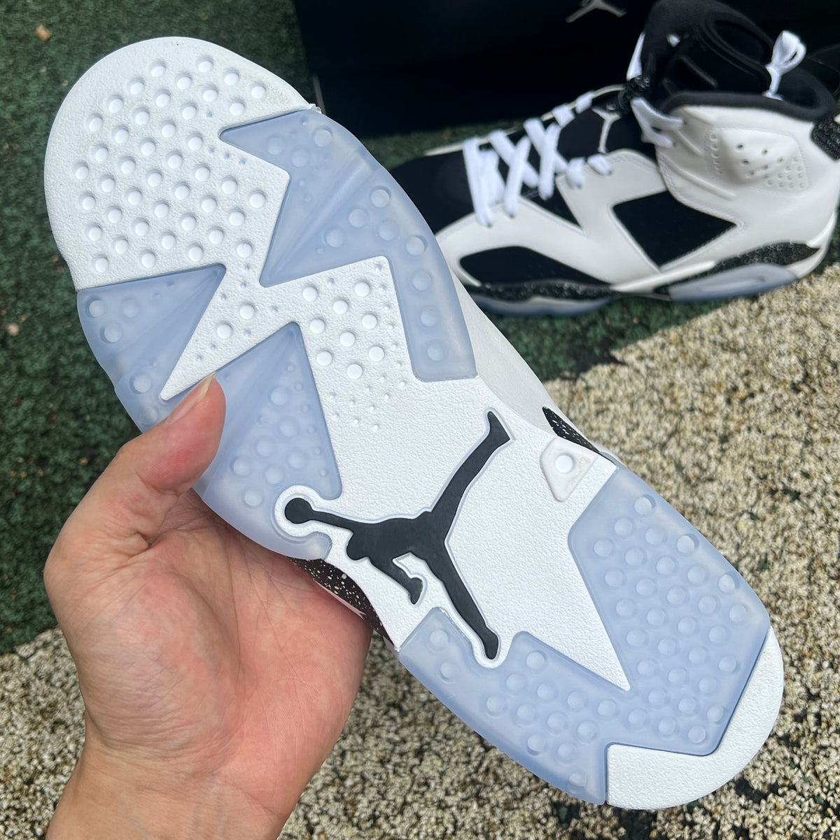 Nike Air Jordan 6 Retro Oreo sneakers in black and white, featuring the iconic design and branding details.