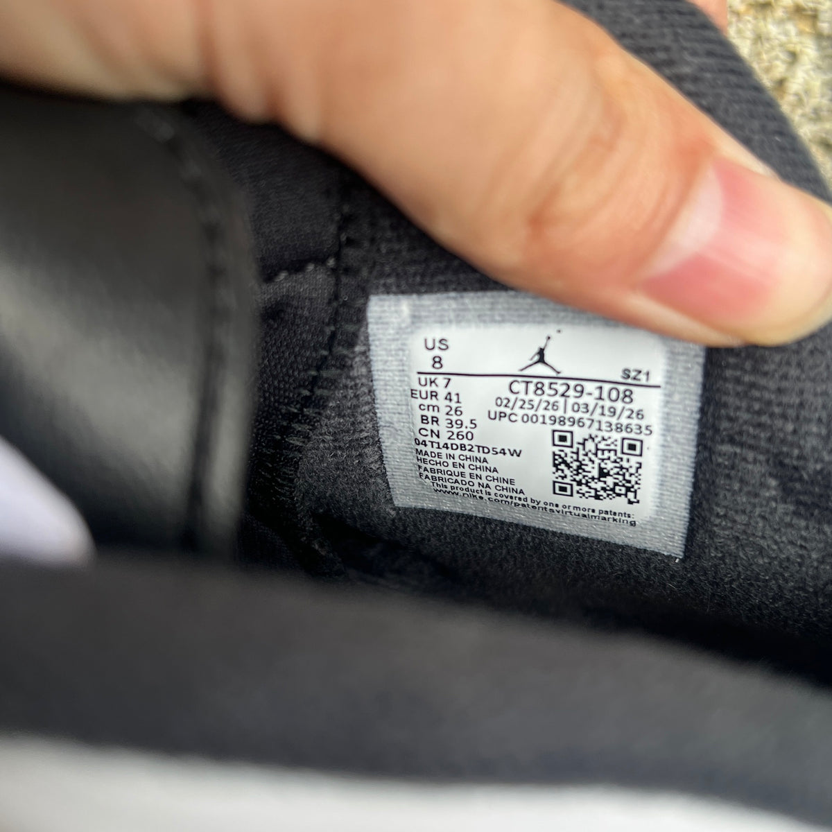 Nike Air Jordan 6 Retro Oreo sneakers in black and white, featuring the distinctive design and branding of Nike and Jordan.