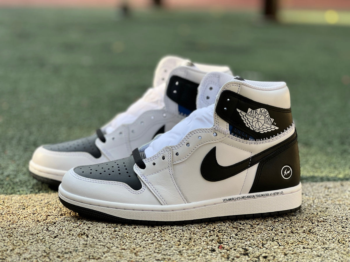 Nike Air Jordan 1 Retro High OG SP Fragment x Union LA sneakers in white and black, showcasing their stylish design and premium materials.
