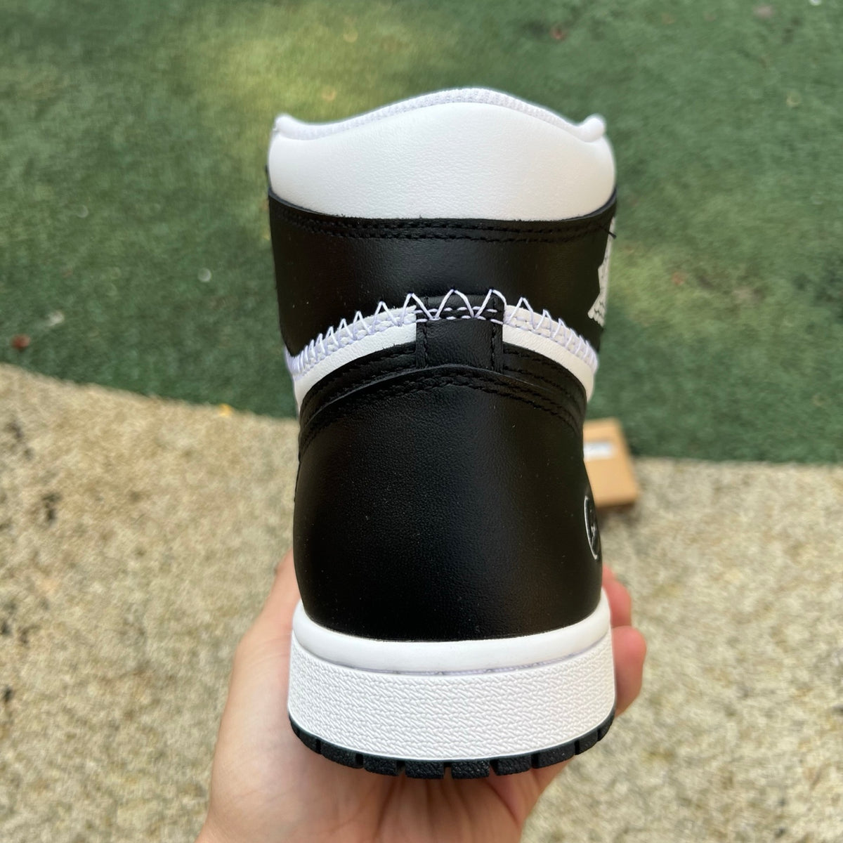 Nike Air Jordan 1 Retro High OG SP Fragment x Union LA sneakers in white and black, featuring iconic design details.