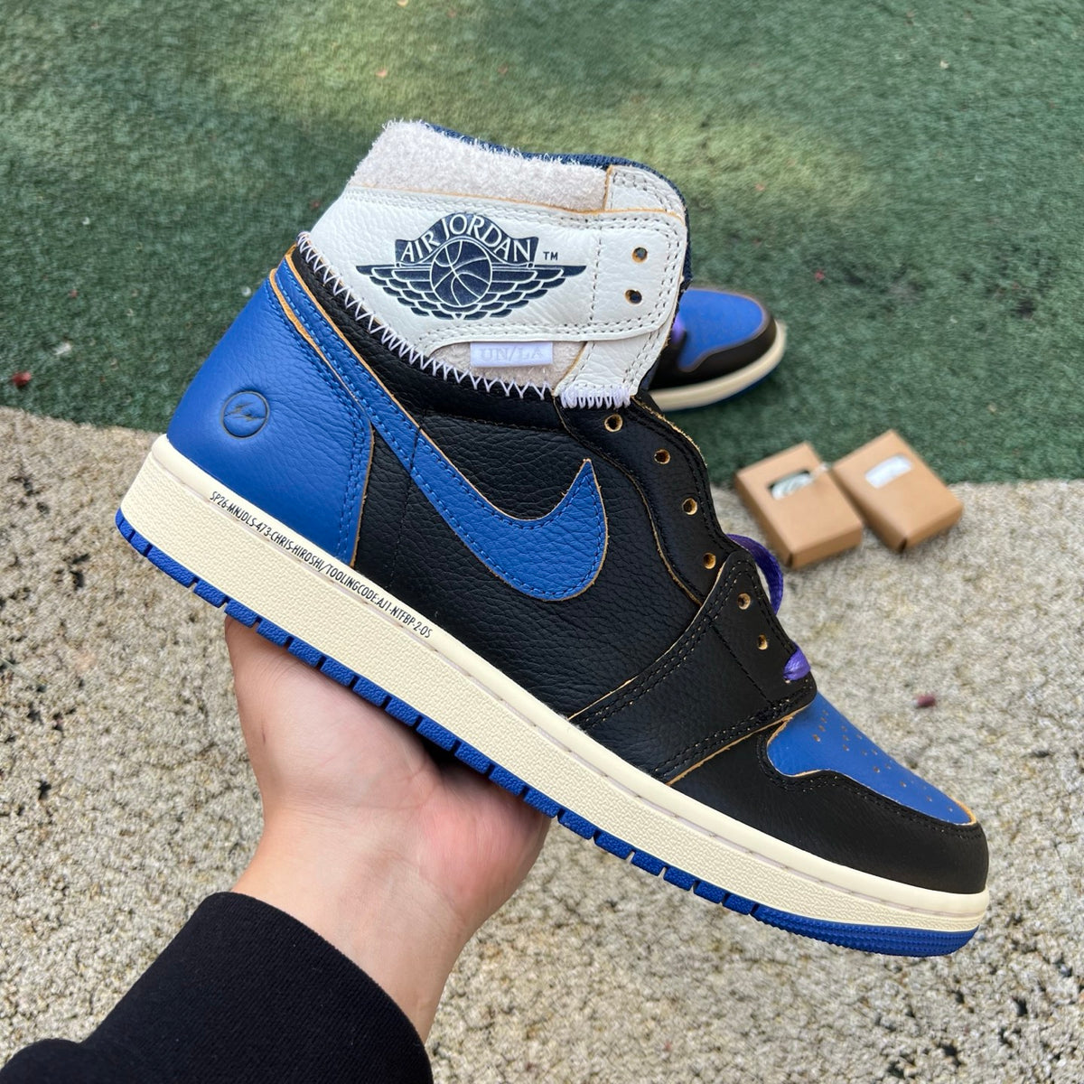 Nike Air Jordan 1 Retro High OG SP Fragment x Union LA sports Royal sneaker with blue leather and iconic design details.