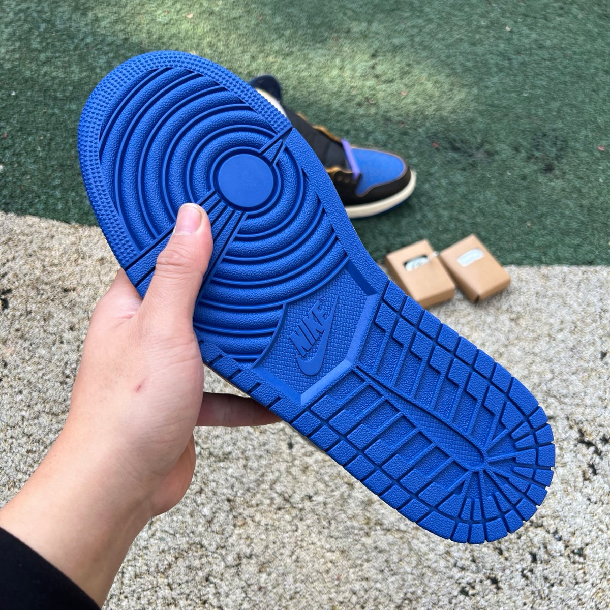 Nike Air Jordan 1 Retro High OG SP Fragment x Union LA sneakers in royal blue with white and black accents, detailed side view
