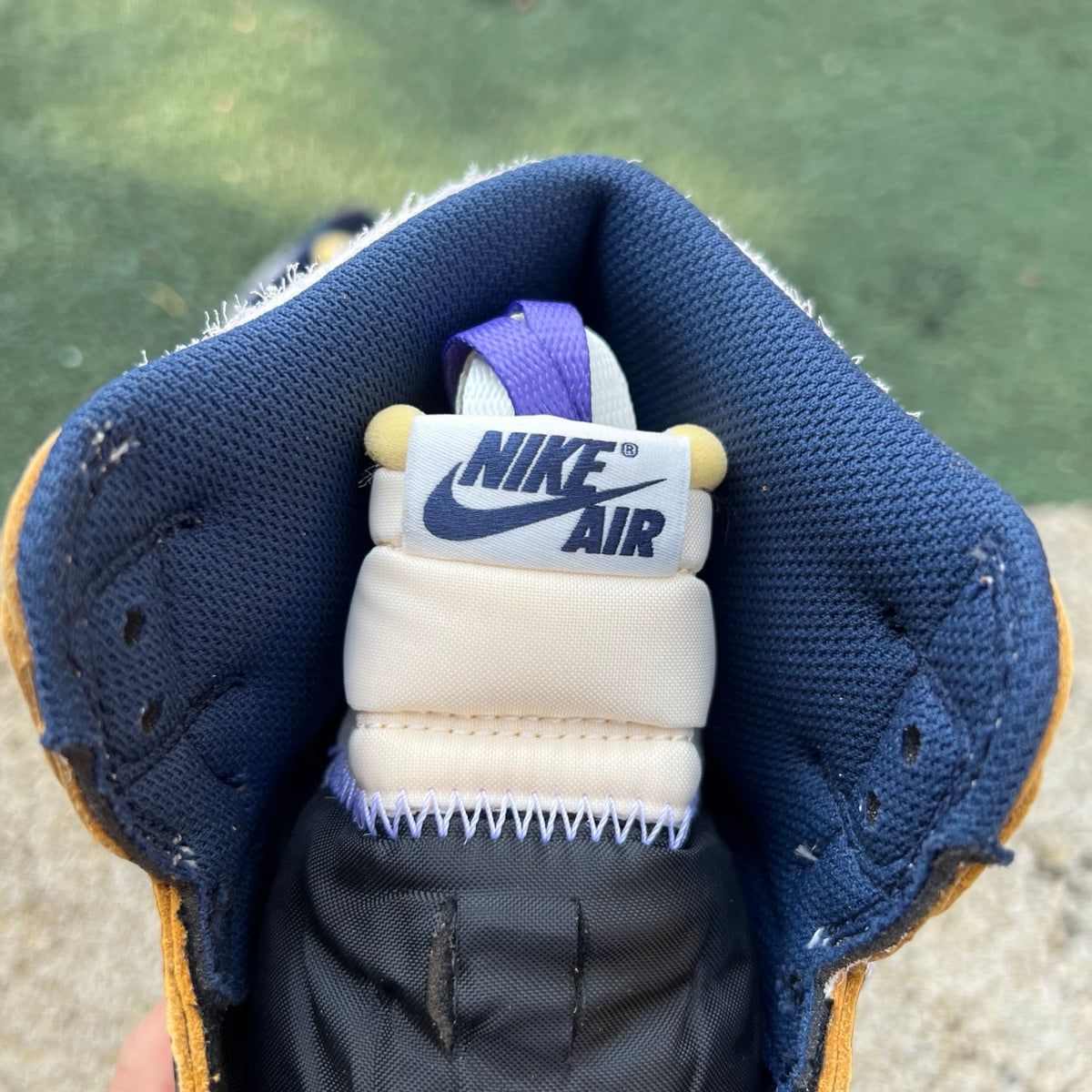 Nike Air Jordan 1 Retro High OG SP Fragment x Union LA sneakers in royal blue, featuring classic high-top design and branding details.