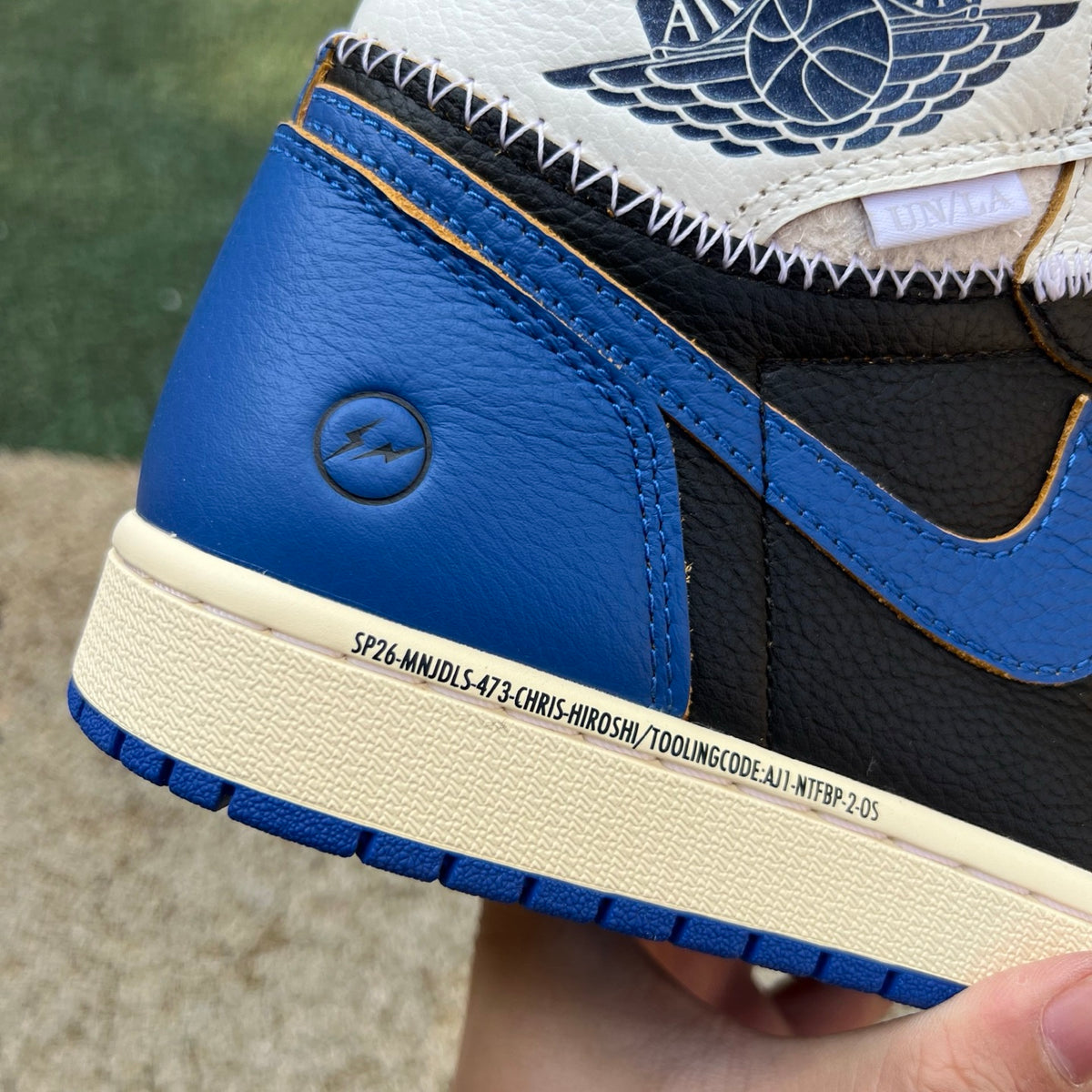 Nike Air Jordan 1 Retro High OG SP Fragment x Union LA sneakers in Royal blue, featuring signature design details and high-top style.