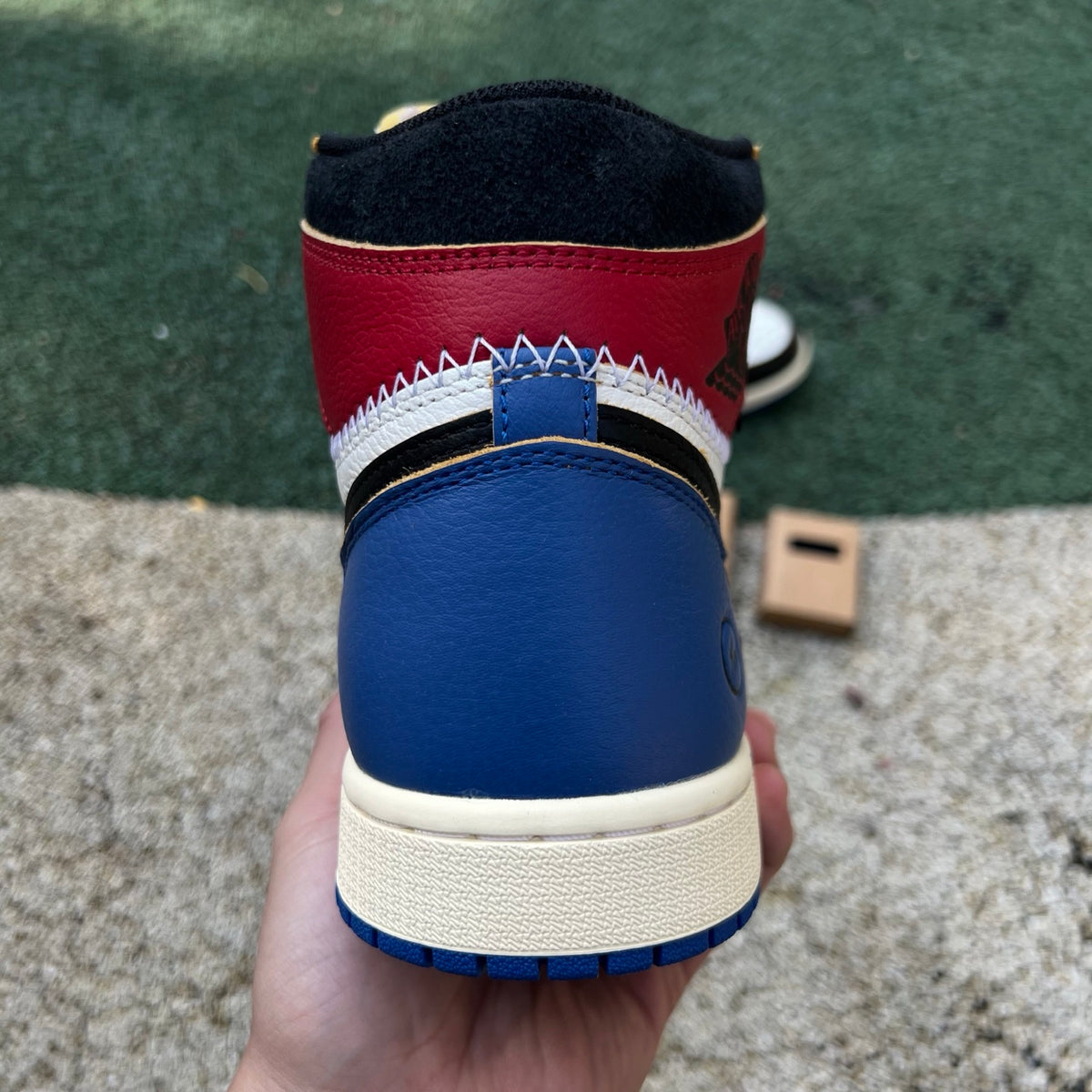 Nike Air Jordan 1 Retro High OG SP Fragment x Union LA sneakers in Varsity Red and Sport Royal, featuring iconic design details.