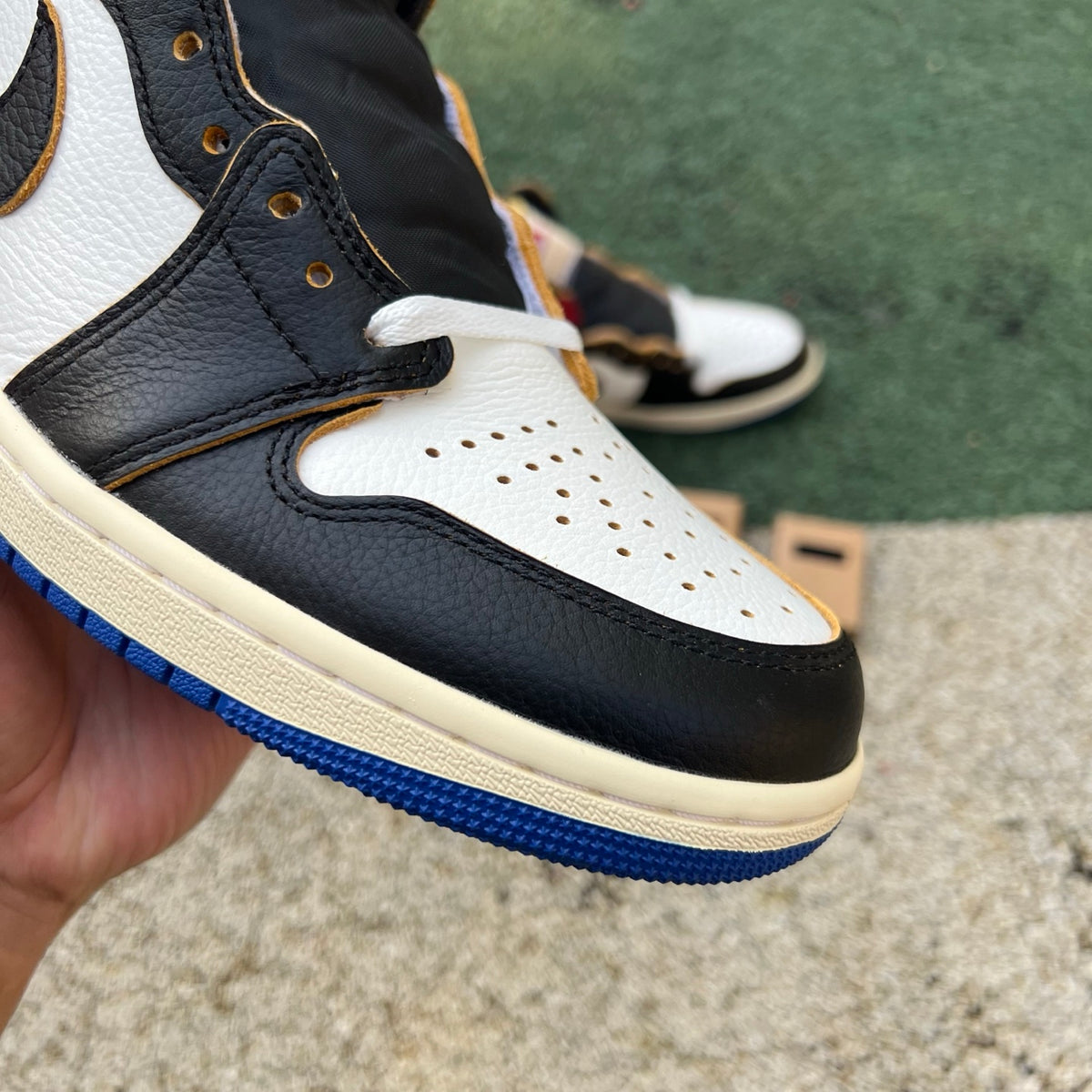 Nike Air Jordan 1 Retro High OG SP Fragment x Union LA sneakers in Varsity Red and Royal blue, showcasing the iconic design.