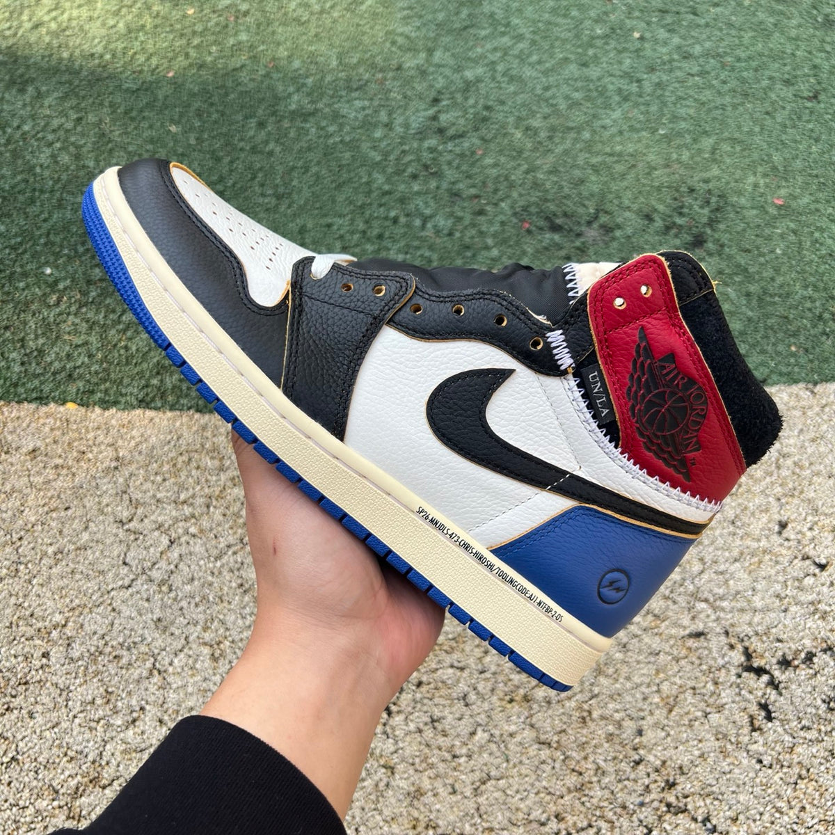 Nike Air Jordan 1 Retro High OG SP Fragment x Union LA sneakers in Varsity Red and Royal Blue with white accents.