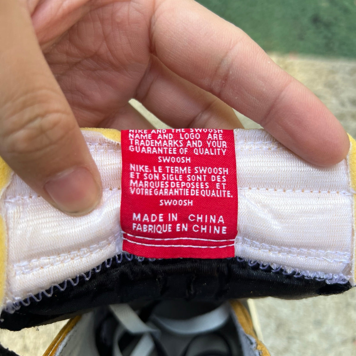 Nike Air Jordan 1 Retro High OG SP Fragment x Union LA varsity red and sport royal sneakers, side view showing design details