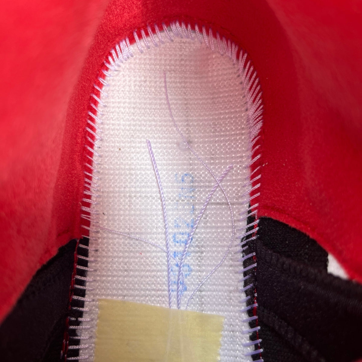Nike Air Jordan 5 Retro Fire Red and Black sneakers with visible tongue and design details, in high-quality image.