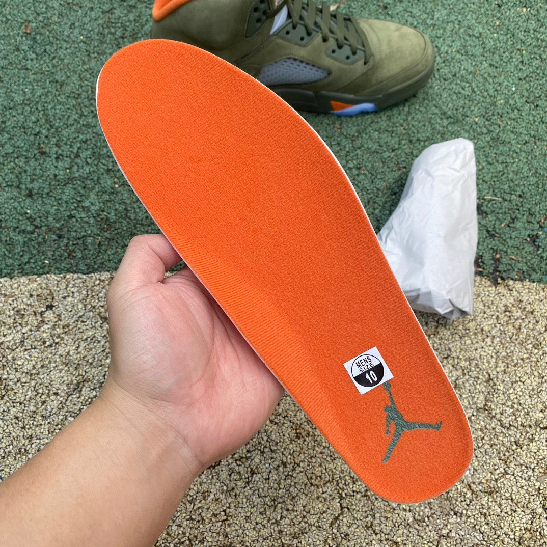 Nike Air Jordan 5 Retro Olive sneakers in black and green with textured detailing and white midsole.
