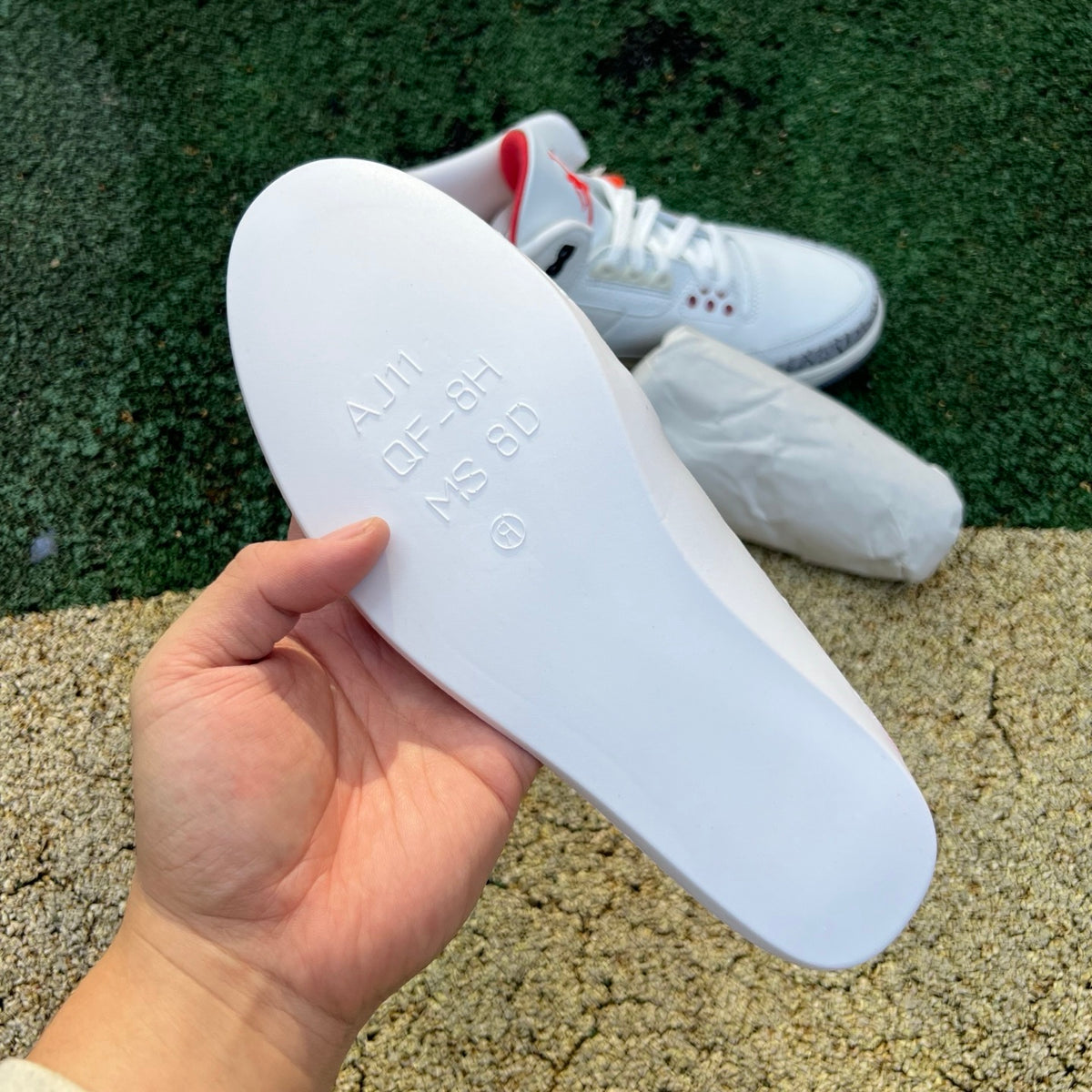 Nike Air Jordan 3 Retro White Cement Reimagined kids' basketball shoes featuring white leather and cement gray accents.