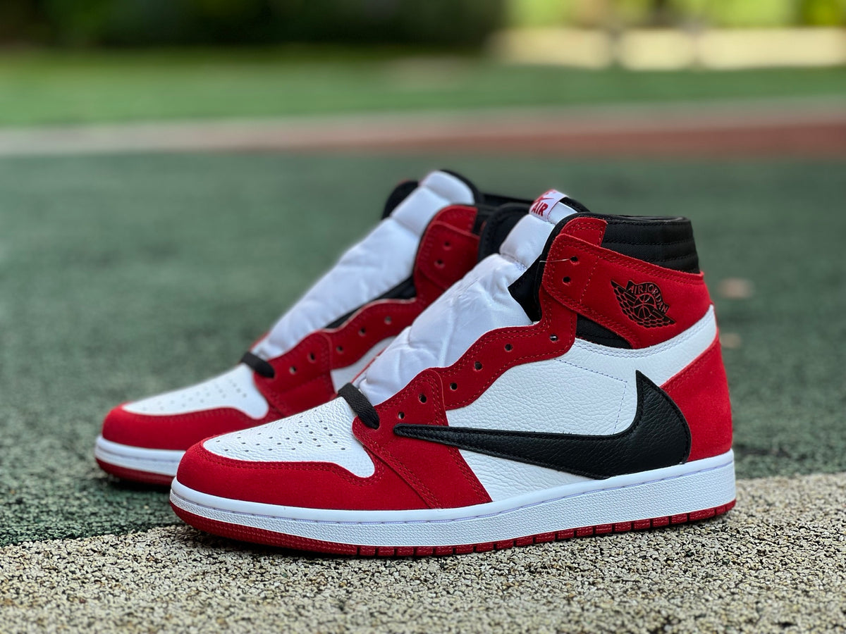 Nike Air Jordan 1 Retro High OG SP Fragment x Travis Scott sneakers, featuring black and white design with signature branding and details