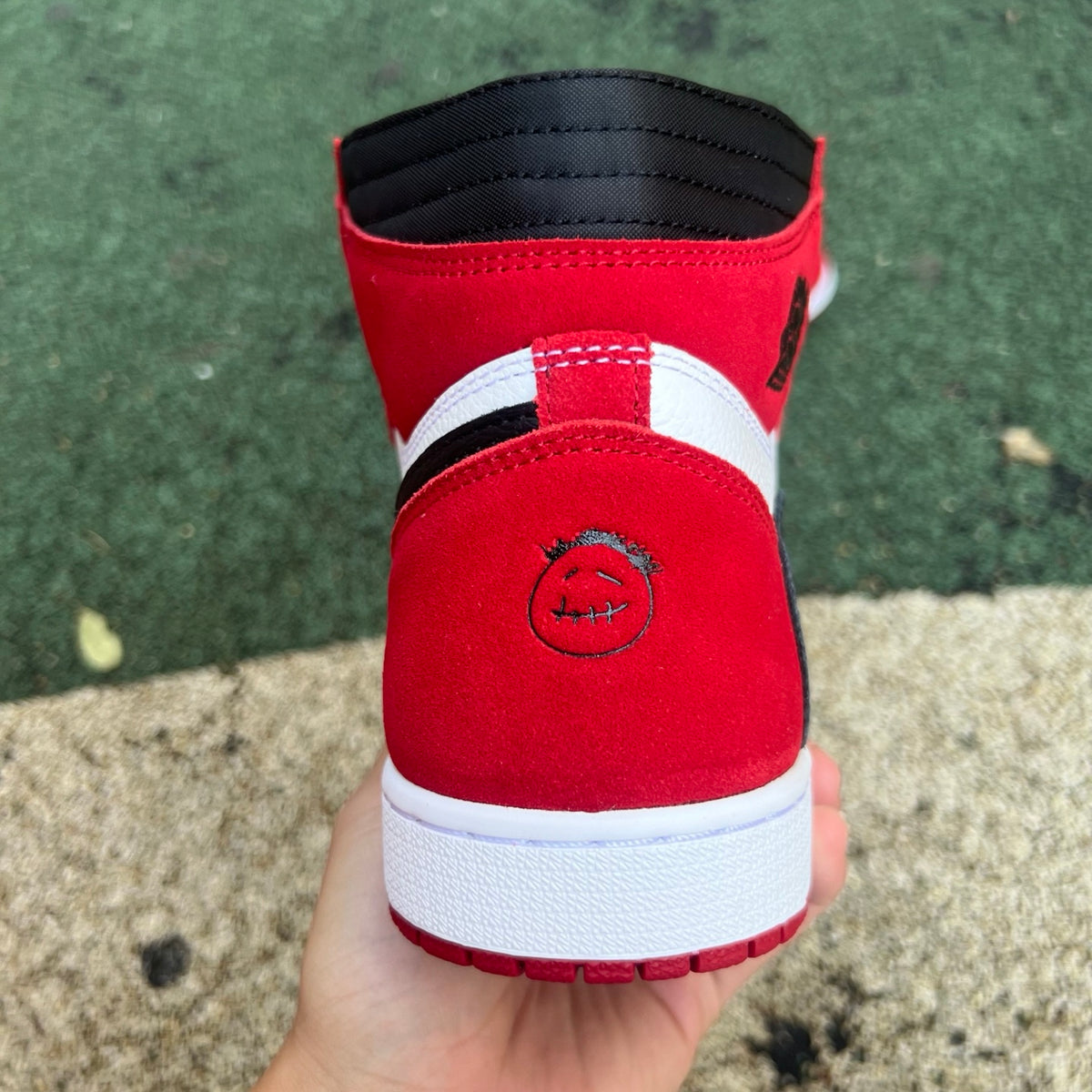 Nike Air Jordan 1 Retro High OG SP Fragment x Travis Scott sneakers, featuring iconic design and collaboration details.