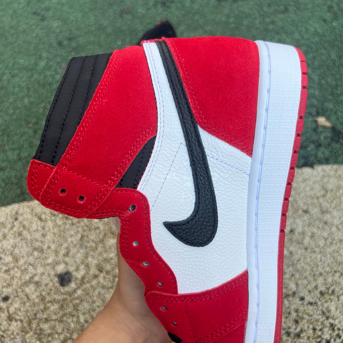 Nike Air Jordan 1 Retro High OG SP Fragment x Travis Scott sneaker in black and brown, featuring iconic design details and branding.