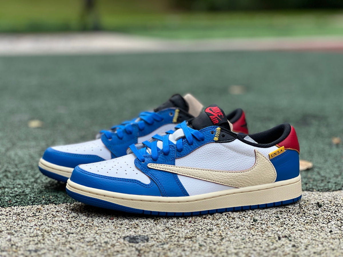 Nike Air Jordan 1 Retro Low OG SP Union LA x Travis Scott sneaker, featuring black and red design with signature branding and low-top style.