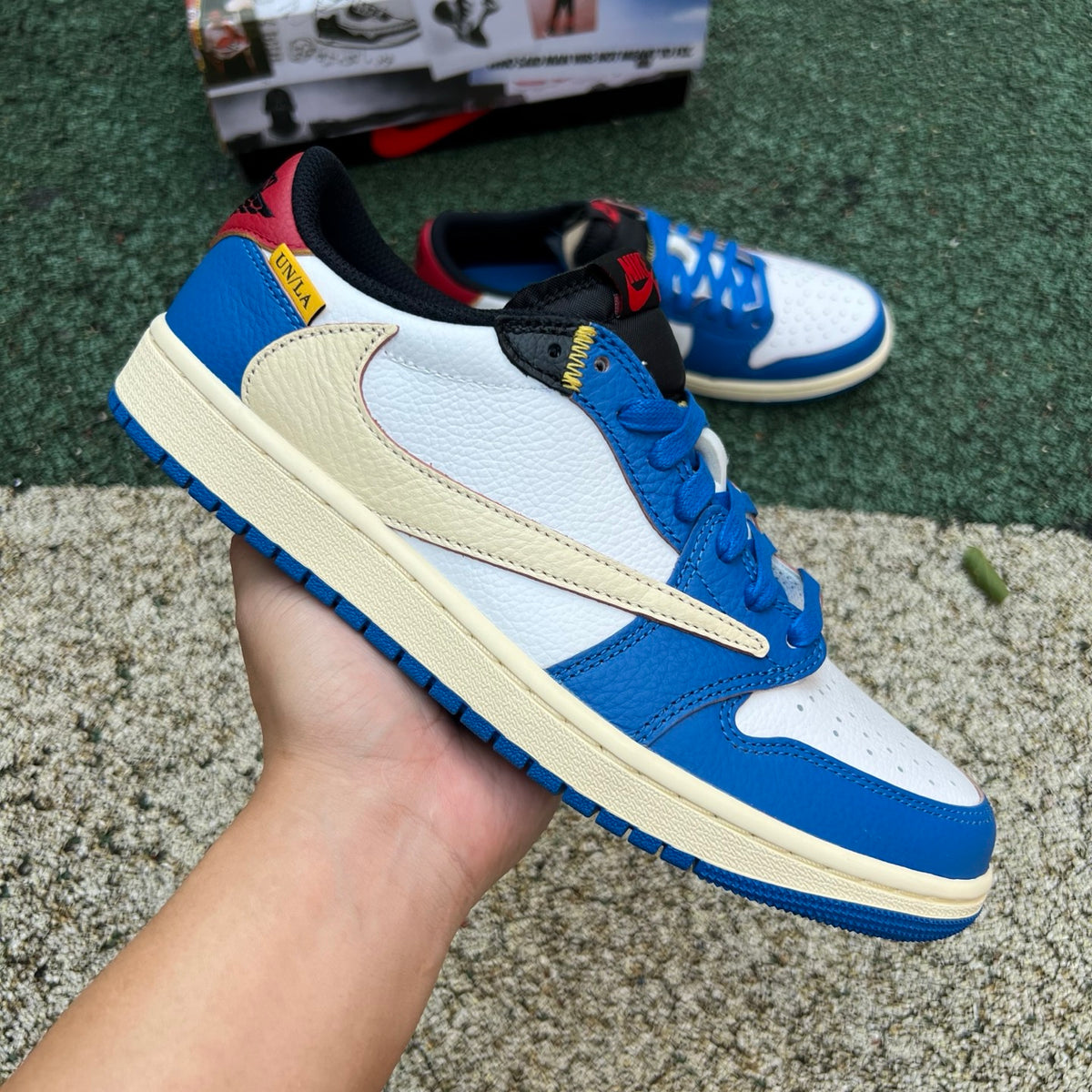 Nike Air Jordan 1 Retro Low OG SP Union LA x Travis Scott sneaker in black and brown leather with white accents and iconic design.