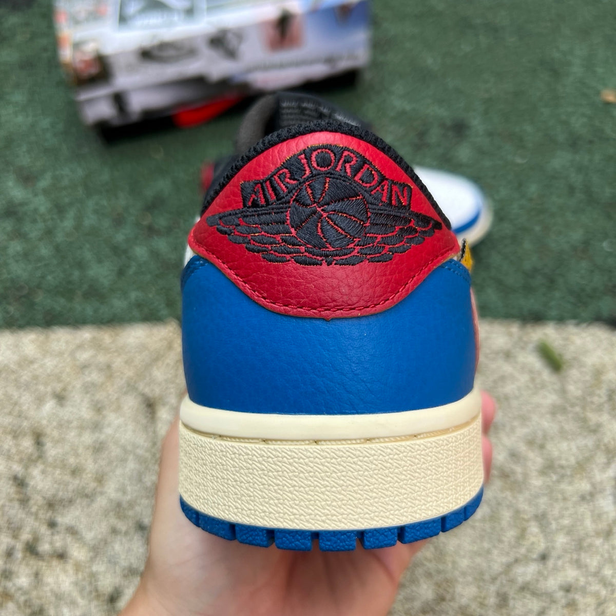 Nike Air Jordan 1 Retro Low OG SP Union LA x Travis Scott sneakers in white and black with signature design details.