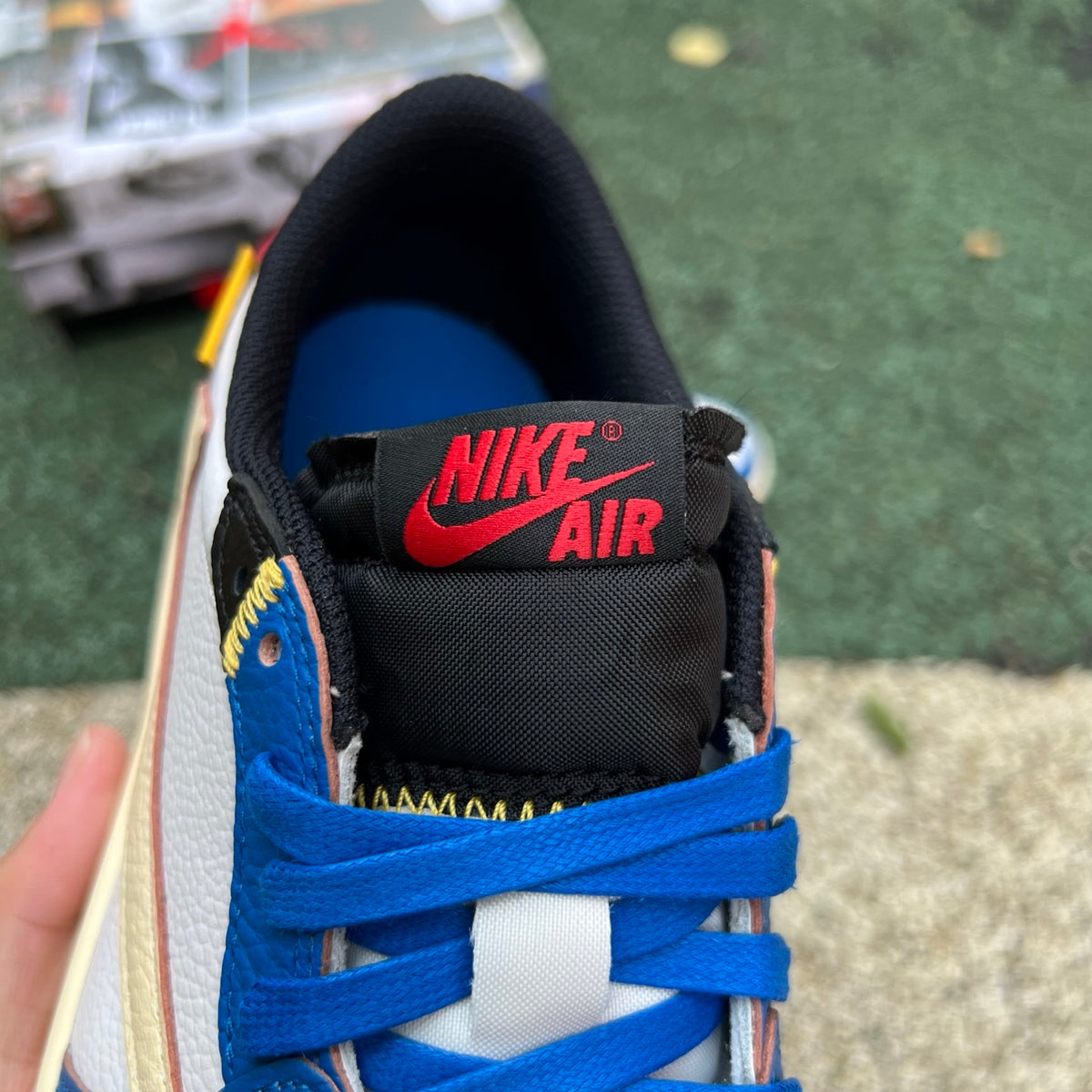 Nike Air Jordan 1 Retro Low OG SP Union LA x Travis Scott sneakers in black and brown with signature design details.