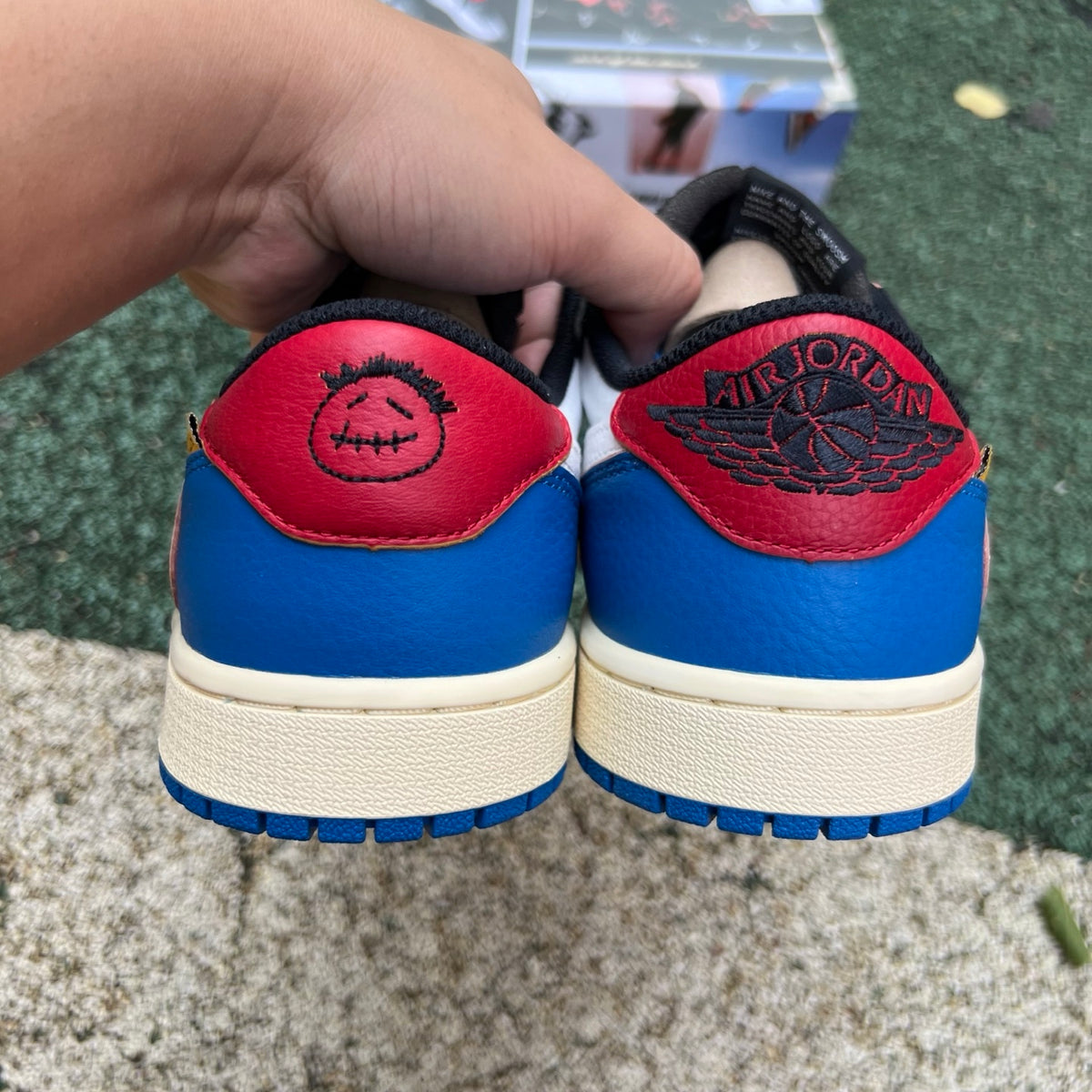 Nike Air Jordan 1 Retro Low OG SP Union LA x Travis Scott sneakers in black and brown with signature design details.