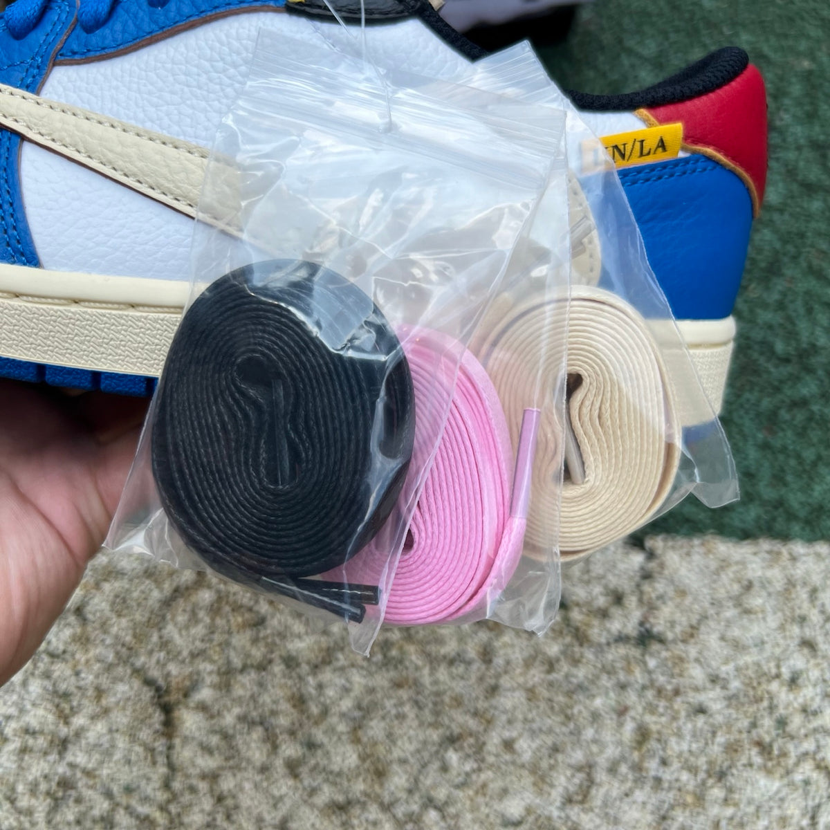 Nike Air Jordan 1 Retro Low OG SP Union LA x Travis Scott sneakers in black and brown with Nike branding and unique design details
