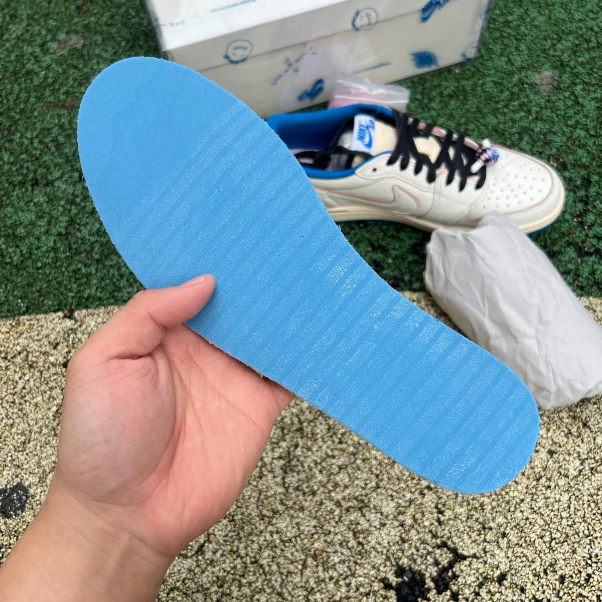 Nike Air Jordan 1 Retro Low OG SP Fragment x Travis Scott sneakers in Sail and Military Blue with branding details