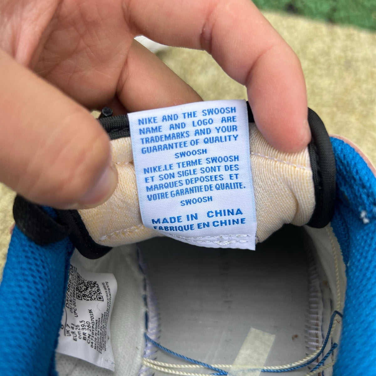 Nike Air Jordan 1 Retro Low OG SP Fragment x Travis Scott sneakers in Sail and Military Blue with Nike and Jordan branding