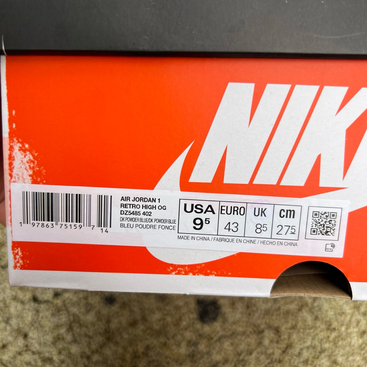 Nike Air Jordan 1 Retro High OG UNC Reimagined sneakers in blue and white with Nike and Jordan branding