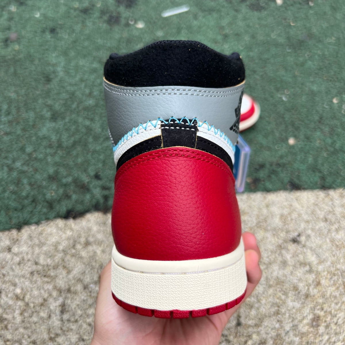 Nike Air Jordan 1 Retro High OG SP Union LA Chicago Shadow sneakers, featuring a gray and black colorway with Nike and Jordan branding.