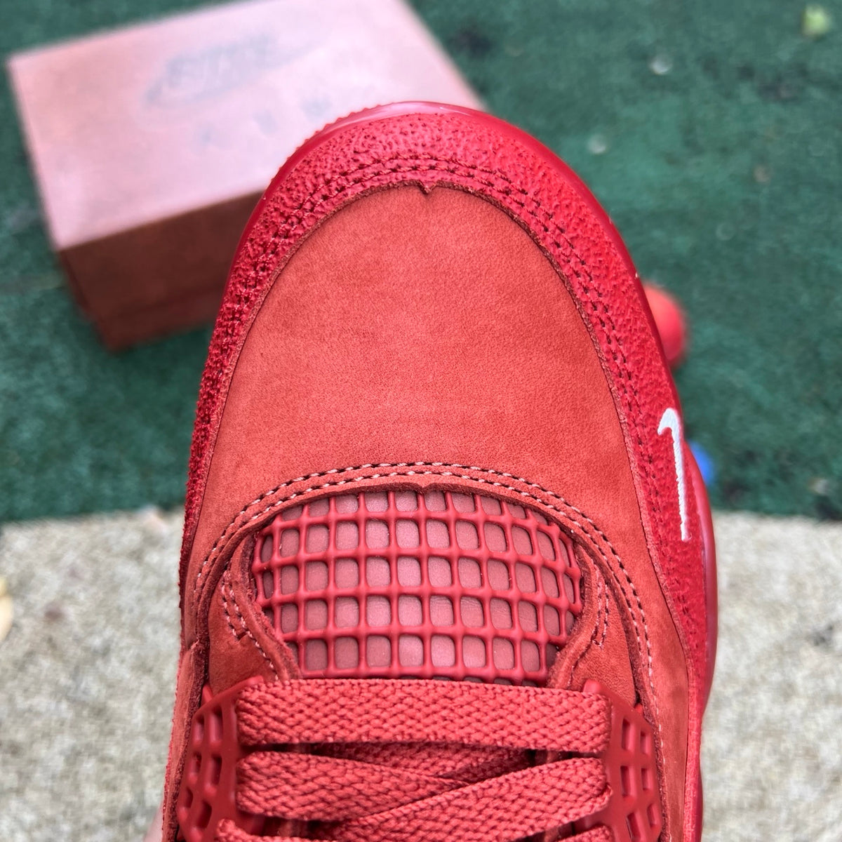 Nike Air Jordan 4 Retro OG SP Nigel Sylvester Brick by Brick sneakers in black and red with detailed brick pattern design.