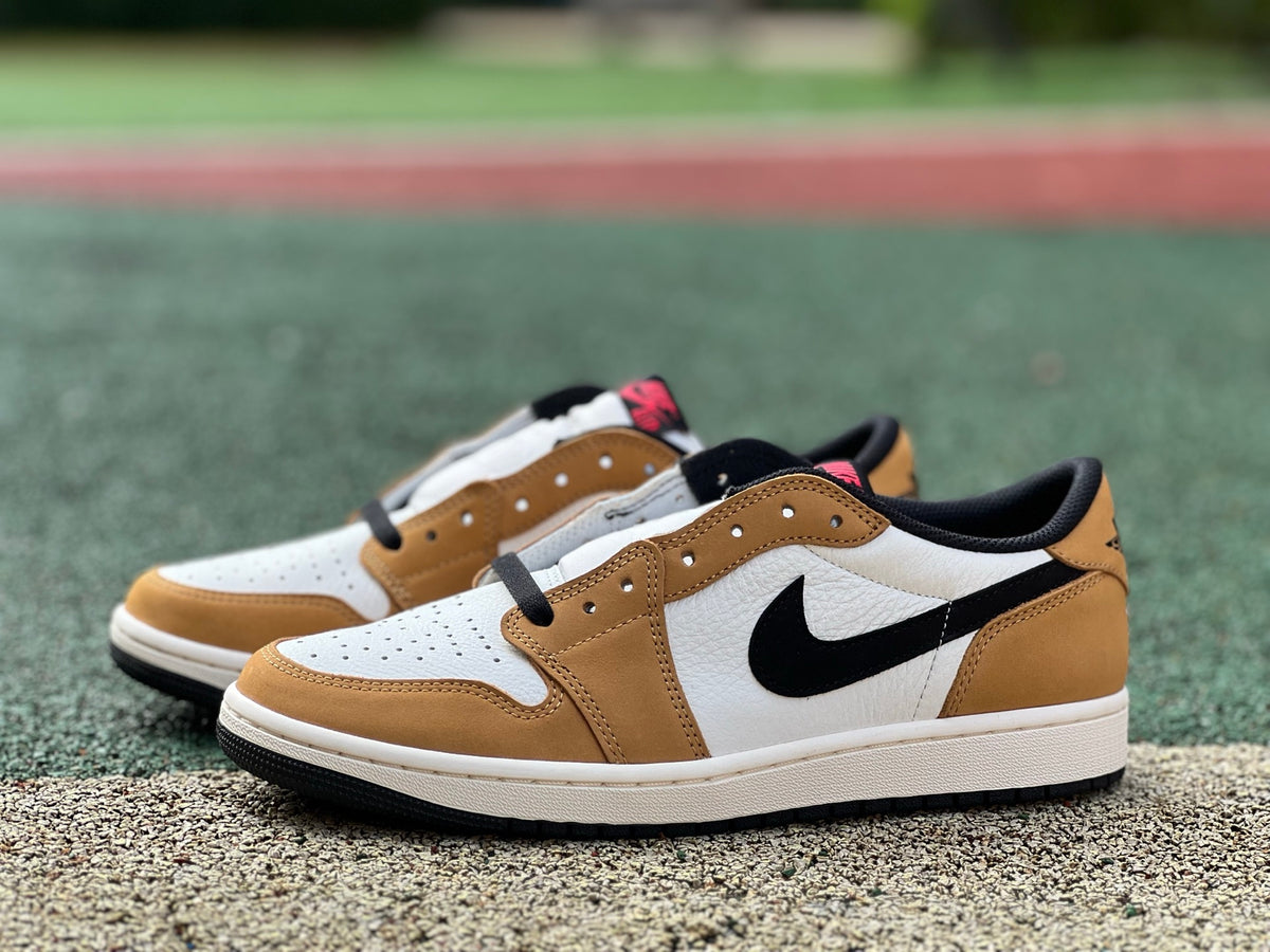 Nike Air Jordan 1 Low OG Rookie of the Year sneakers in white and black with Nike and Jordan branding.