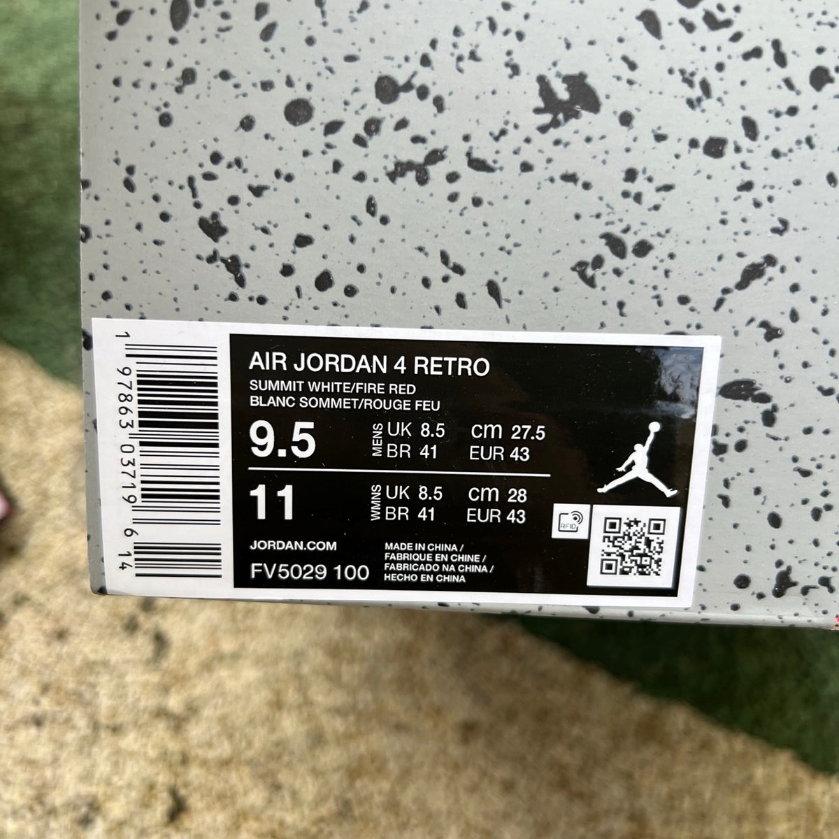 Nike Air Jordan 4 Retro White Cement sneakers featuring white and grey colorway, classic design, and Nike x Jordan branding.