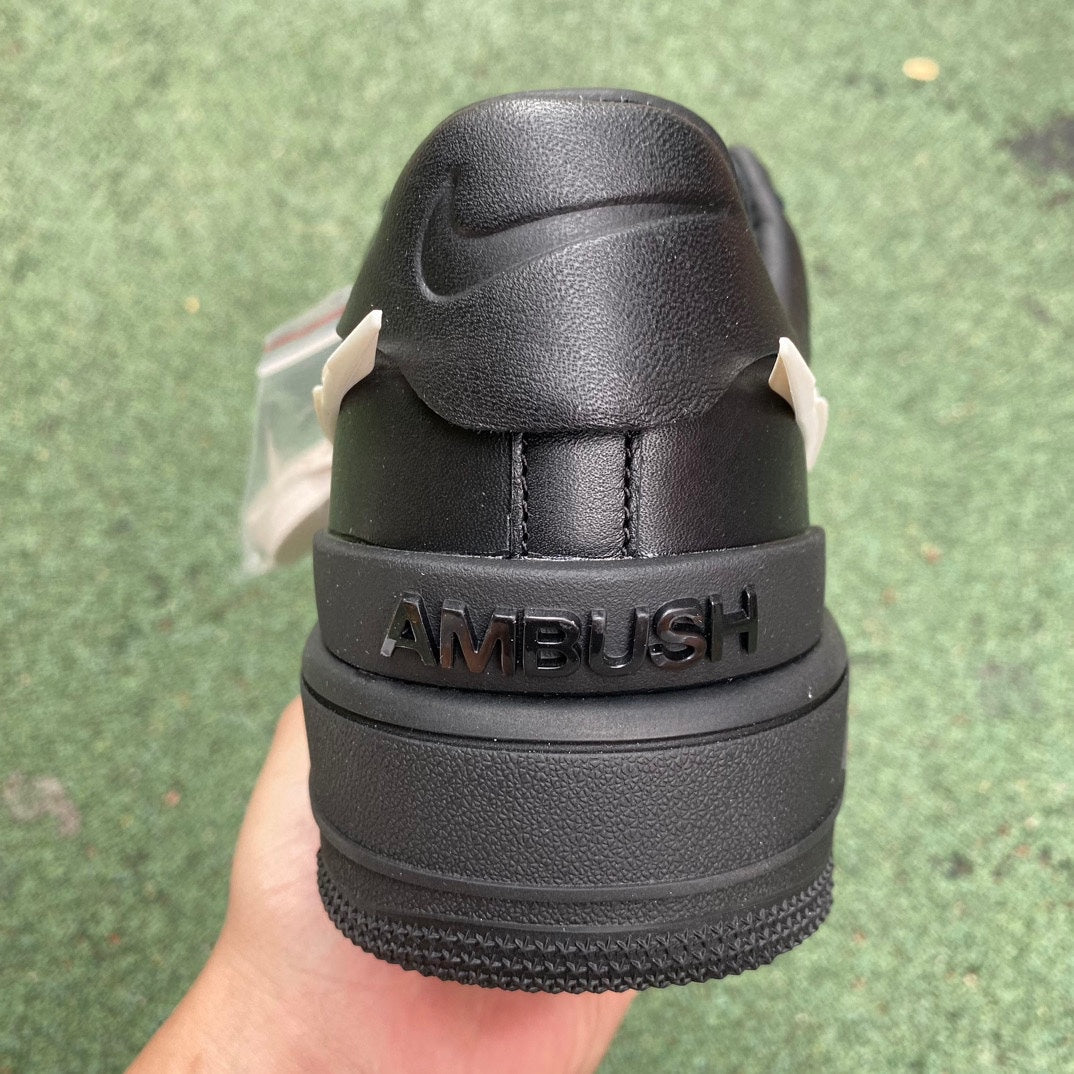 Nike Air Force 1 Low SP AMBUSH black sneakers with Nike x Jordan branding, featuring a sleek design and classic silhouette.