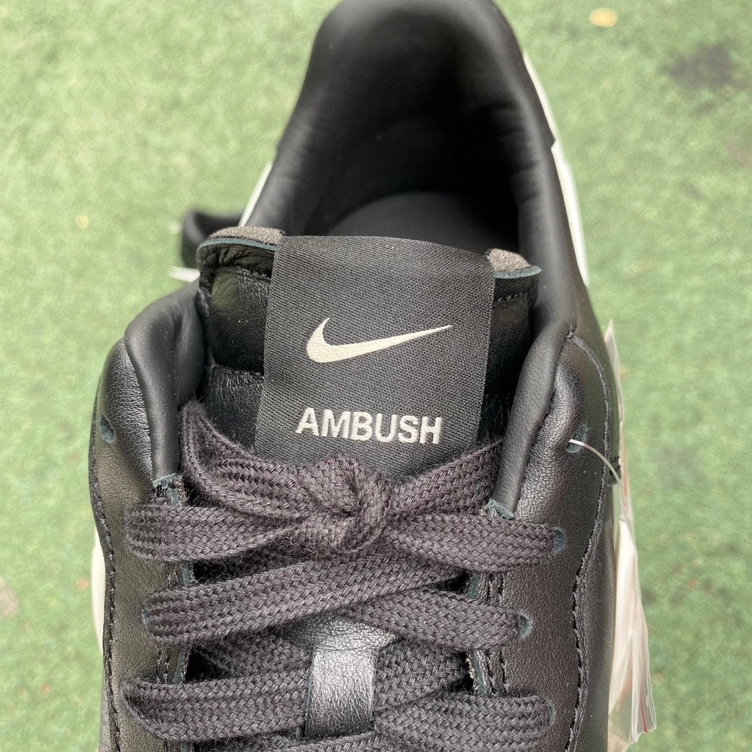 Nike Air Force 1 Low SP AMBUSH black sneakers with white Nike swoosh and unique design details.