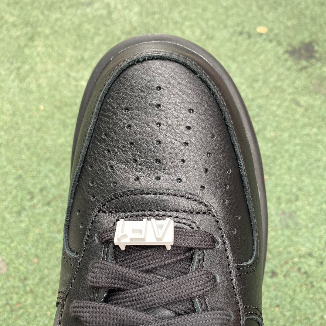 Nike Air Force 1 Low SP AMBUSH black sneakers, showcasing the stylish design and branding details of the Nike x Jordan collaboration.