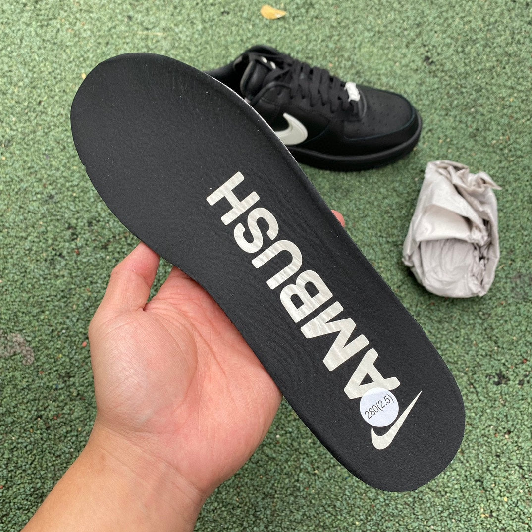 Nike Air Force 1 Low SP AMBUSH black sneakers featuring chunky design and collaborative branding, shown from a side angle.