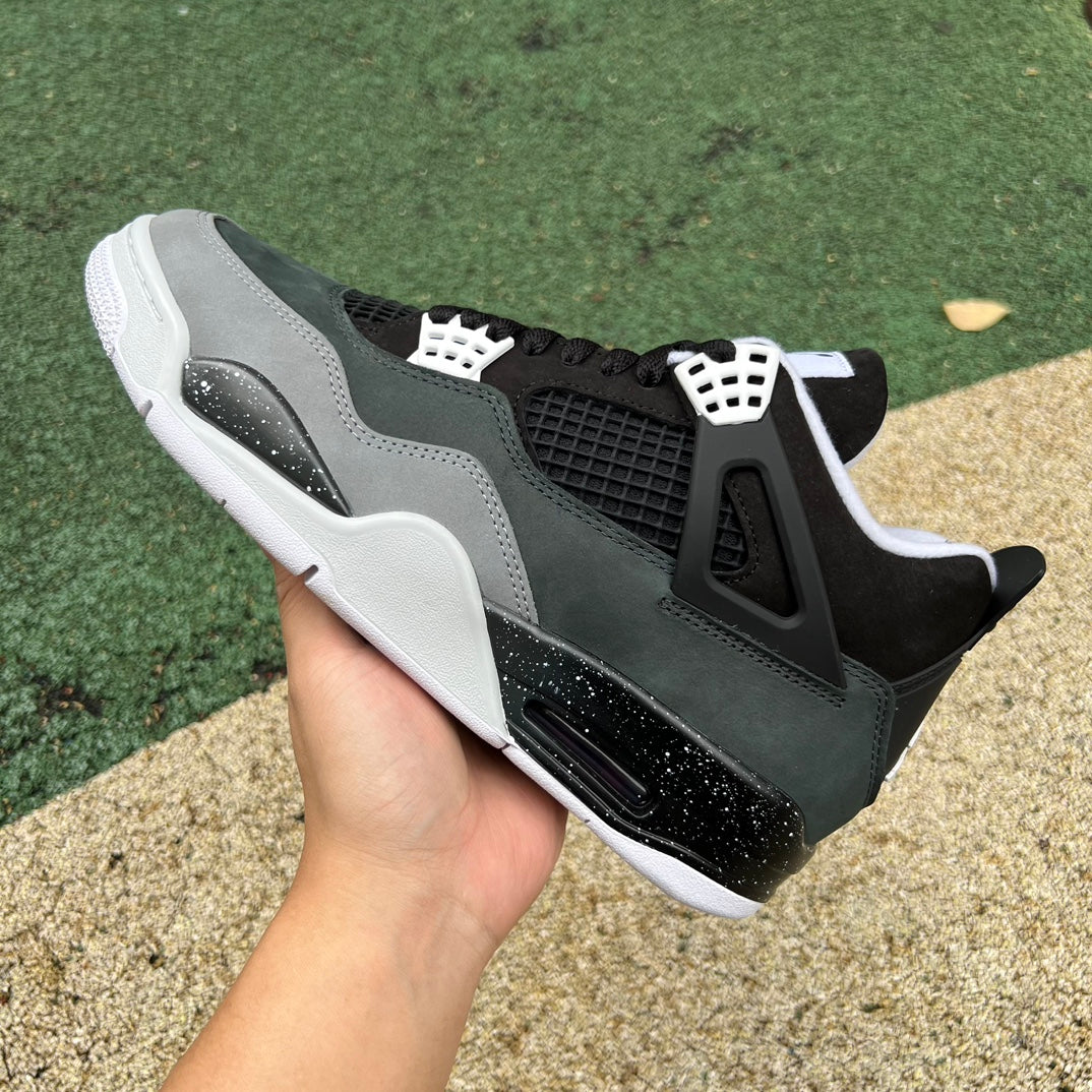 Nike Air Jordan 4 Retro Fear 2024 sneakers in black and red with detailed design and signature Jordan brand branding.