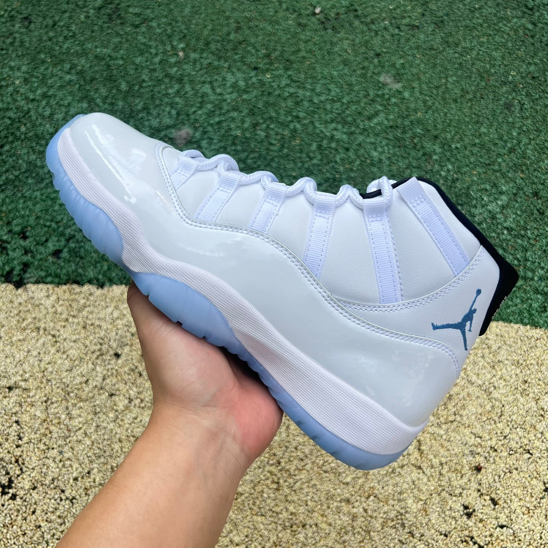 Nike Air Jordan 11 Retro Legend Blue sneakers in blue and white with patent leather accents, showcasing iconic design details.