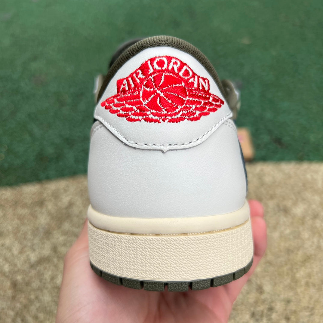 Nike Air Jordan 1 Retro Low OG SP Travis Scott sneakers in medium olive color, featuring classic design and signature branding.